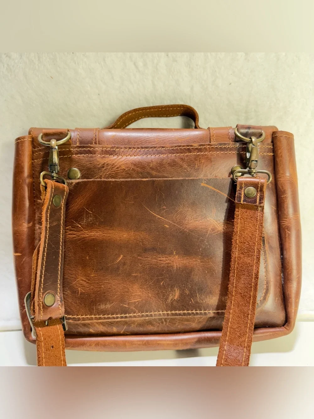 leather satchel crossbody bag with a structured flap front double buckles